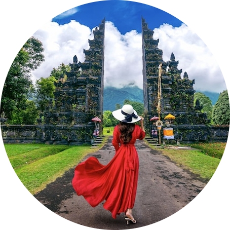 Traveller walking toward temple gates